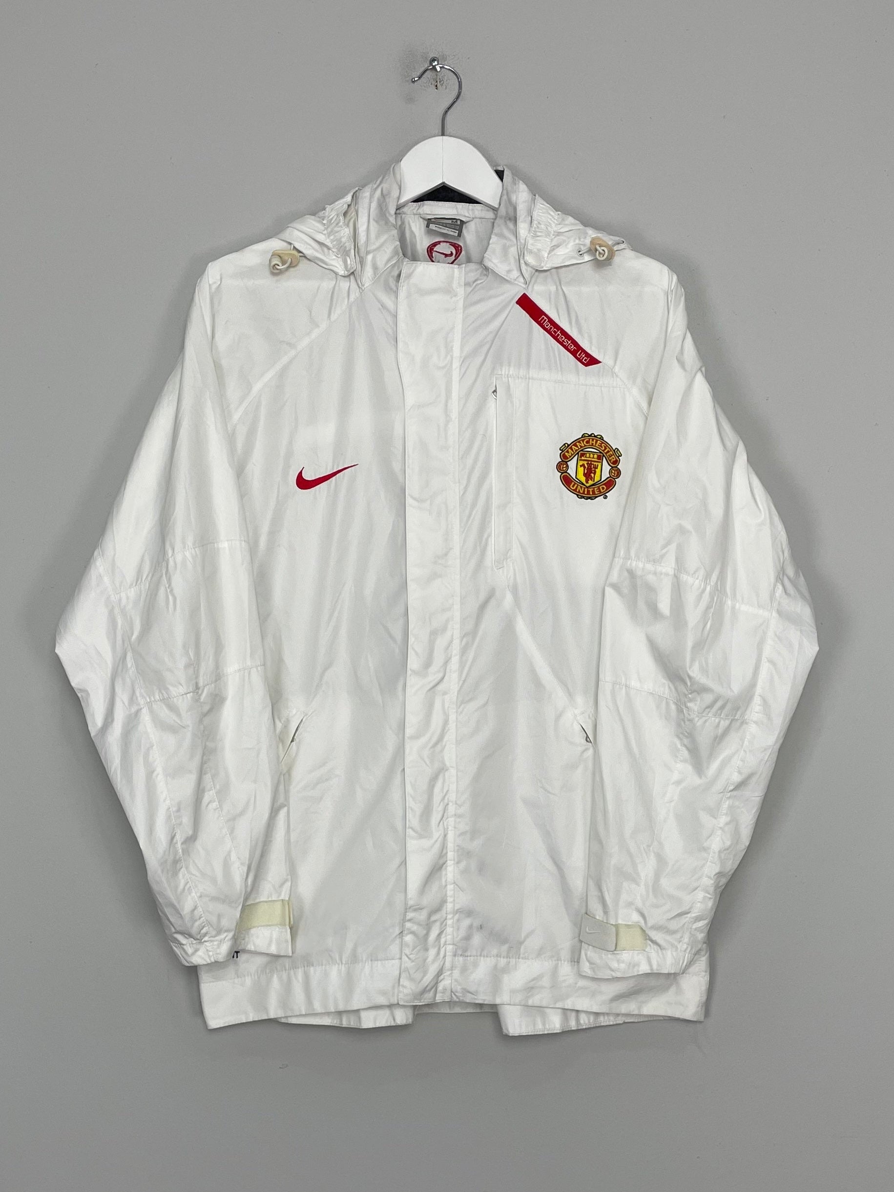 Shop 2010/11 MANCHESTER UNITED RAIN JACKET (M) NIKE, classic football shirts, vintage football shirts & retro soccer jerseys at Cult Kits